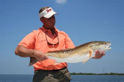Capt. Mike w\ 14lb bull Red